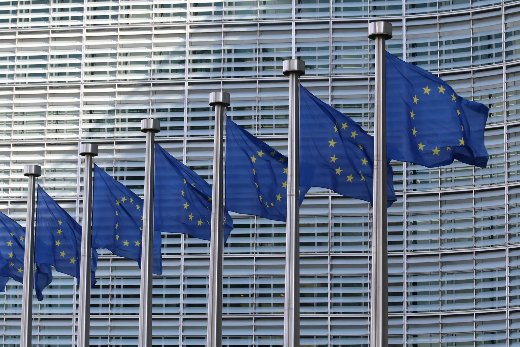 European flags waving at the European Parliament in Brussels (Belgium)